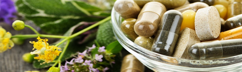 Herbs with alternative medicine herbal supplements and pills